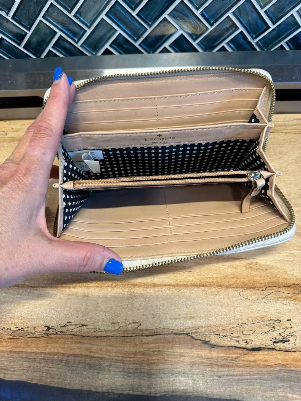 kate spade Quilted Zip-Around Wallet in Ivory